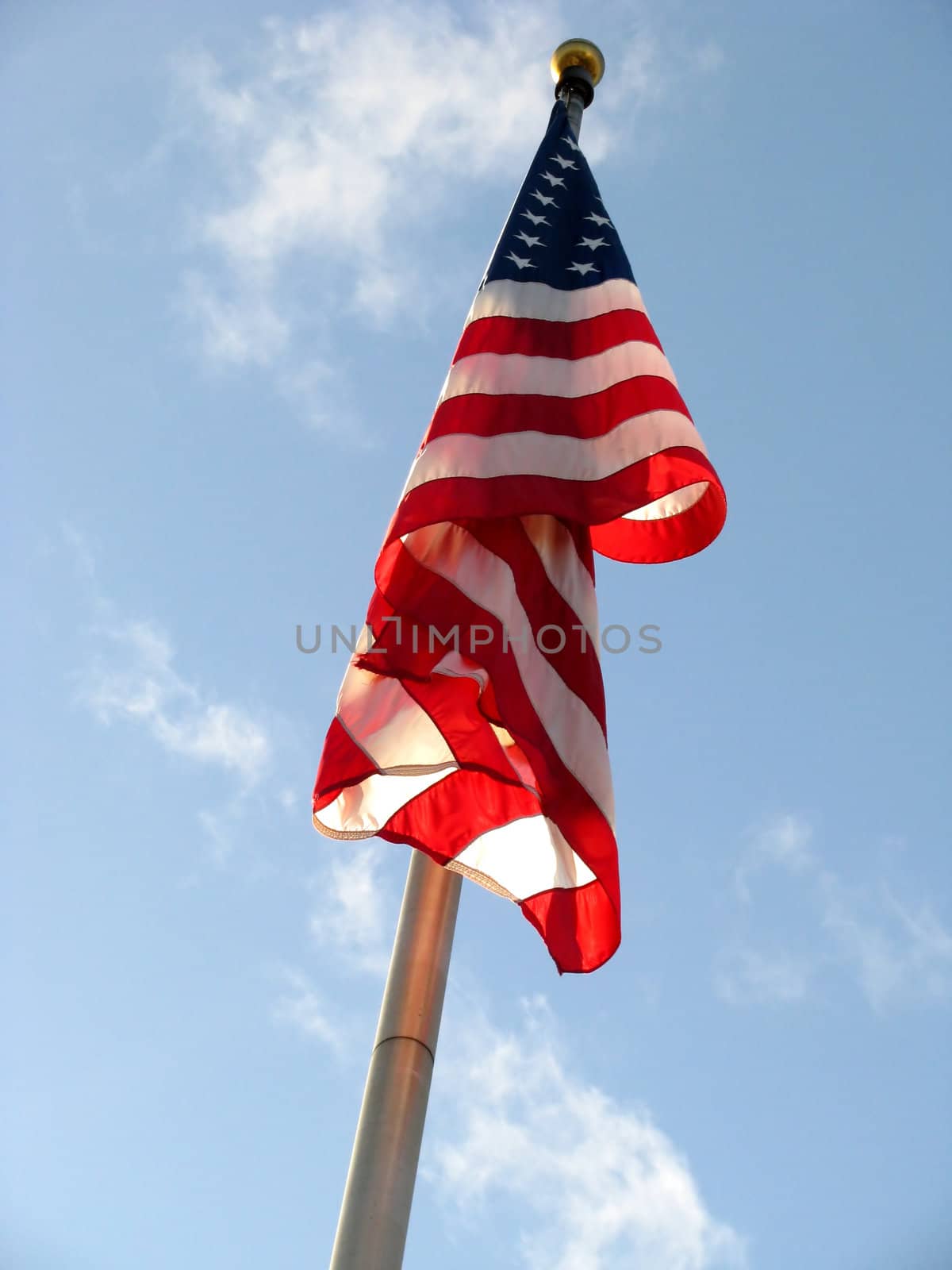 American Flag v2 with Red White and Blue colors set against a blue sky with white clouds.