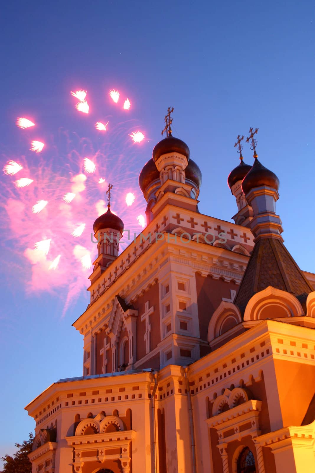 Celebratory fireworks behind chirch