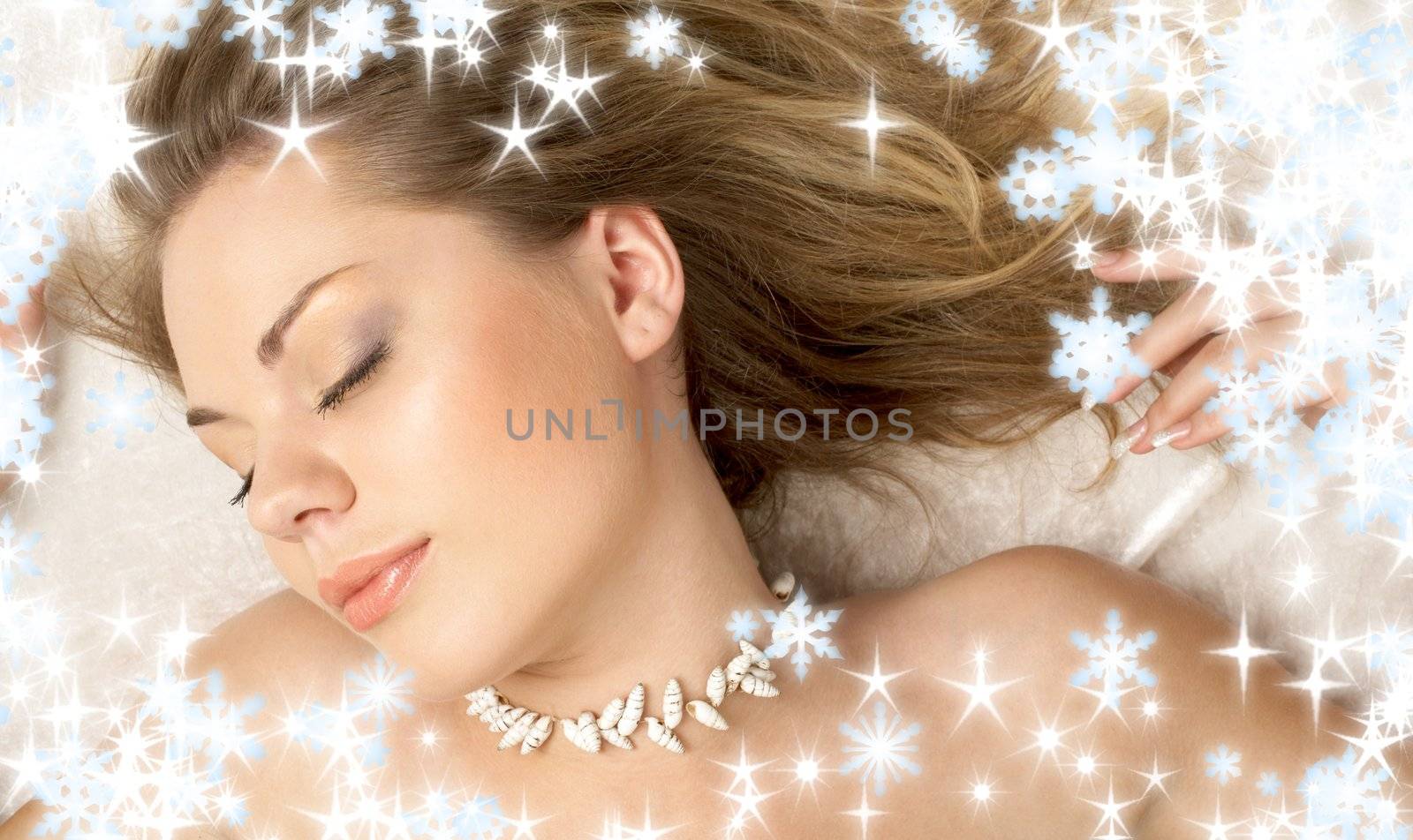 christmas picture of dreaming girl with snowflakes