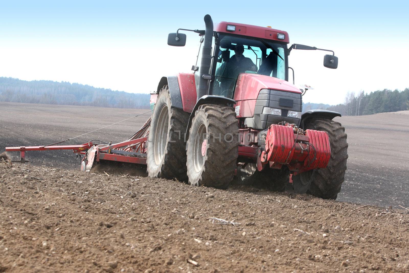 Tractor working on the field