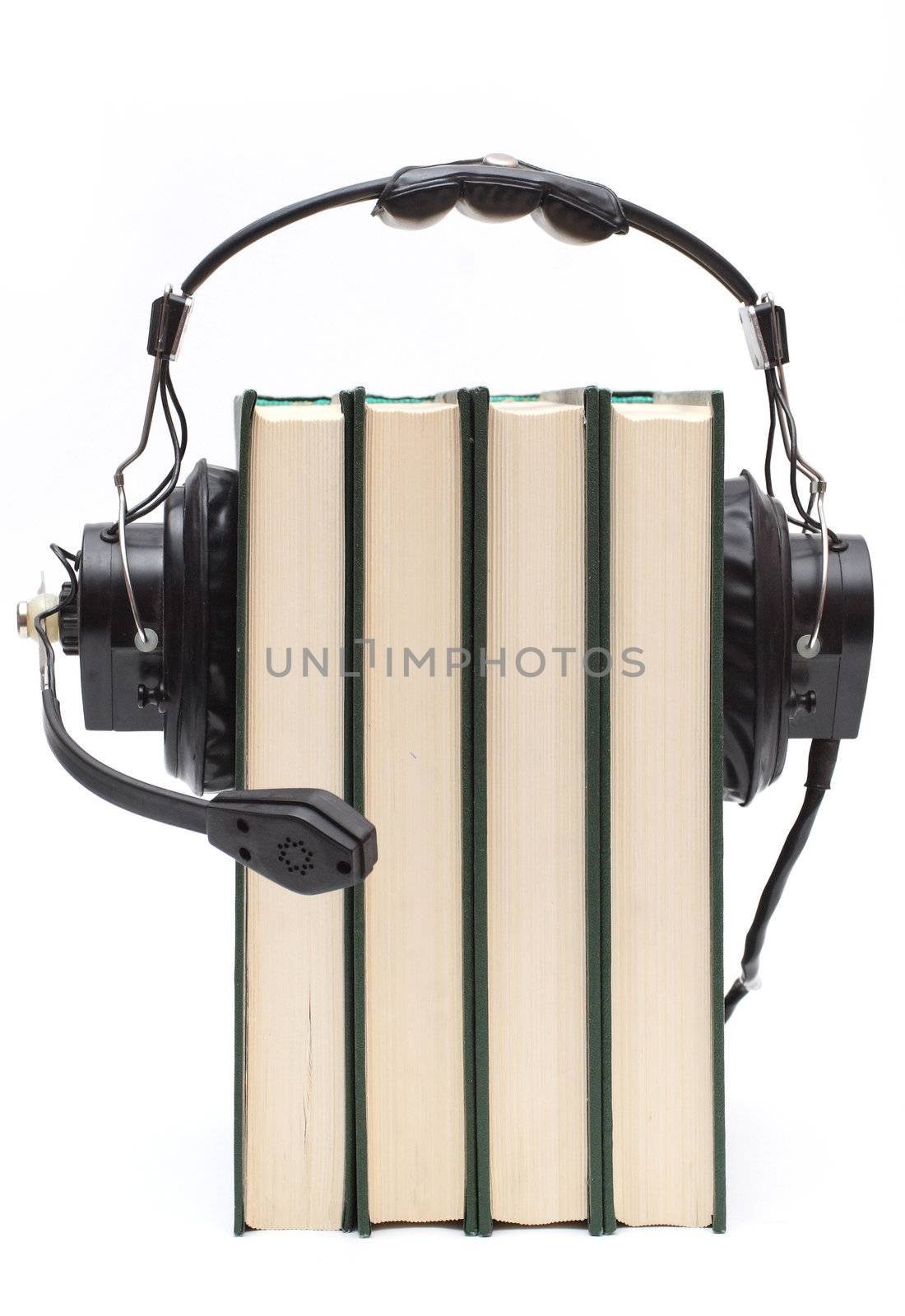 audiobook conception with headphones and books