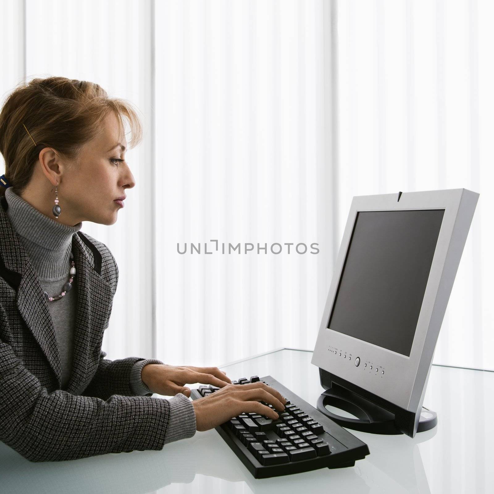 Woman working. by iofoto