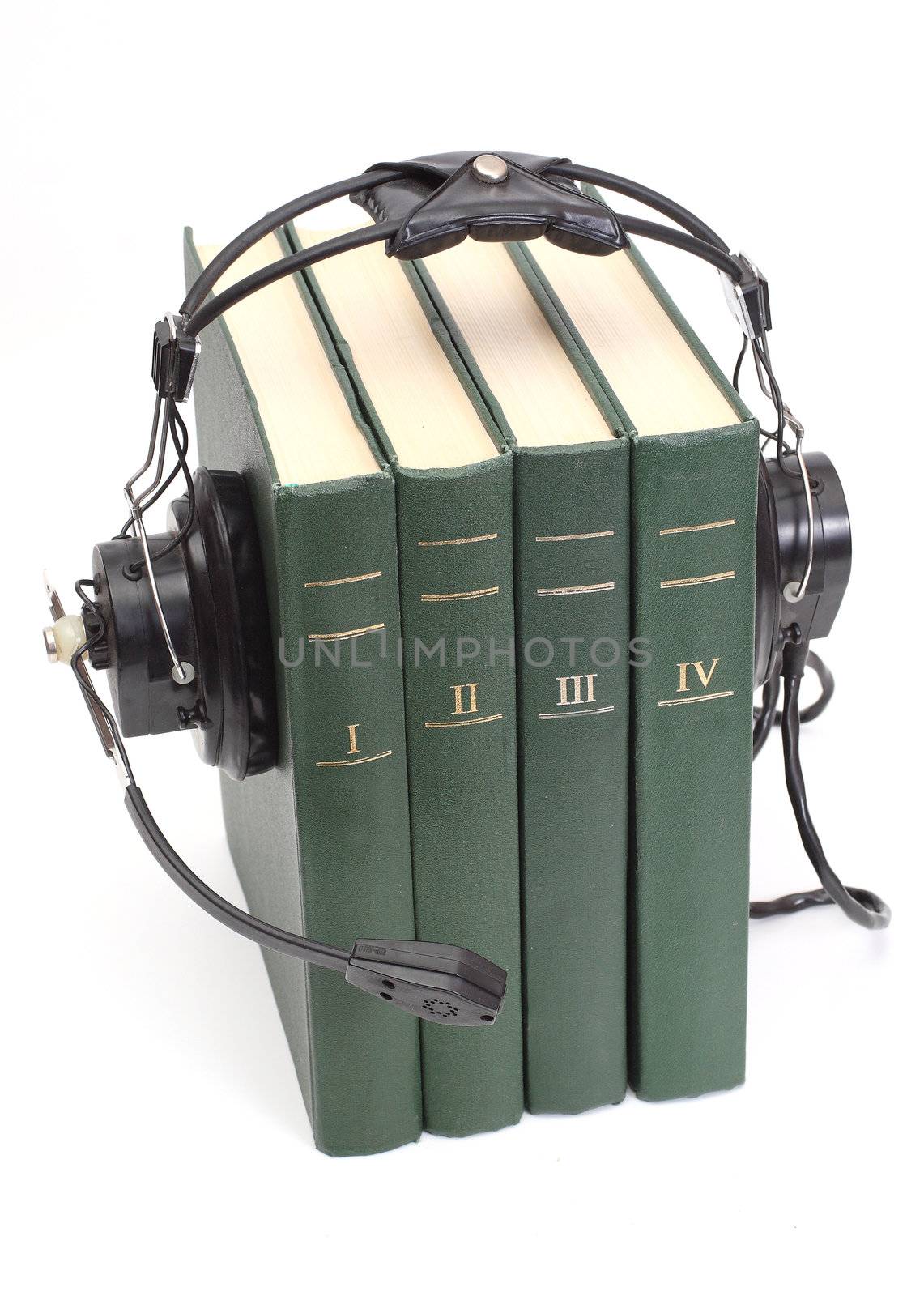 audiobook conception with headphones and books