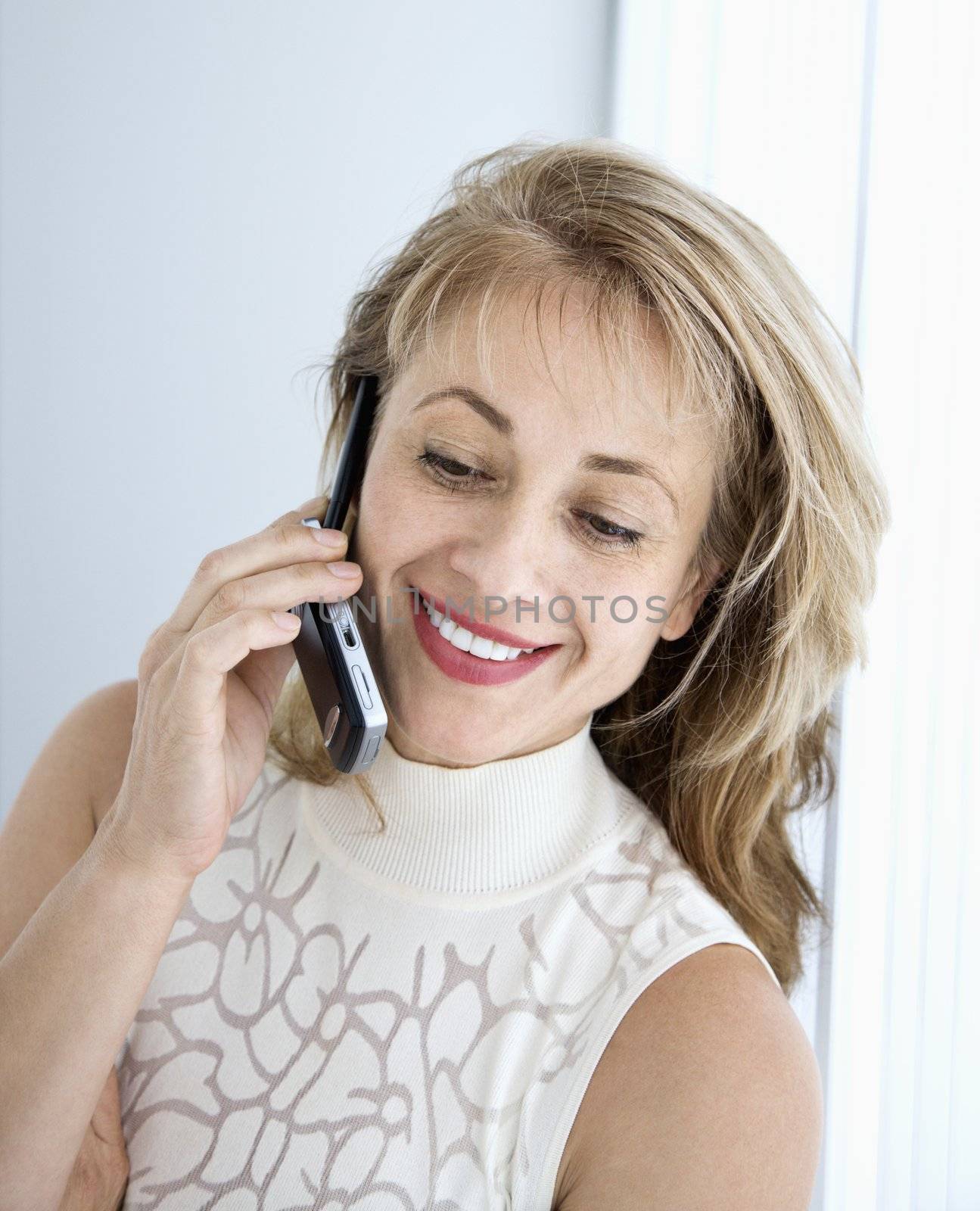 Caucasian woman on cellphone.