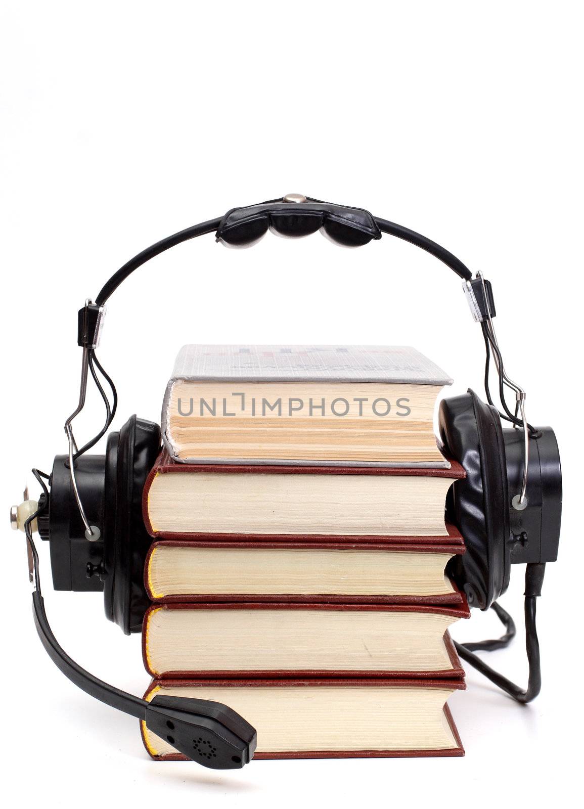 audiobook conception with headphones and books