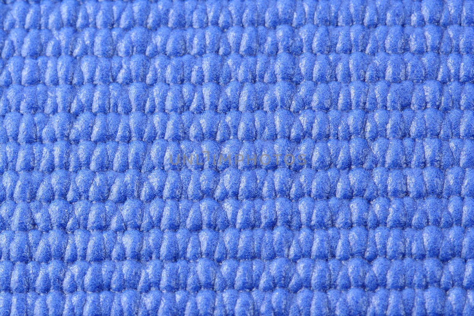 A Macro view of a blue yoga mat