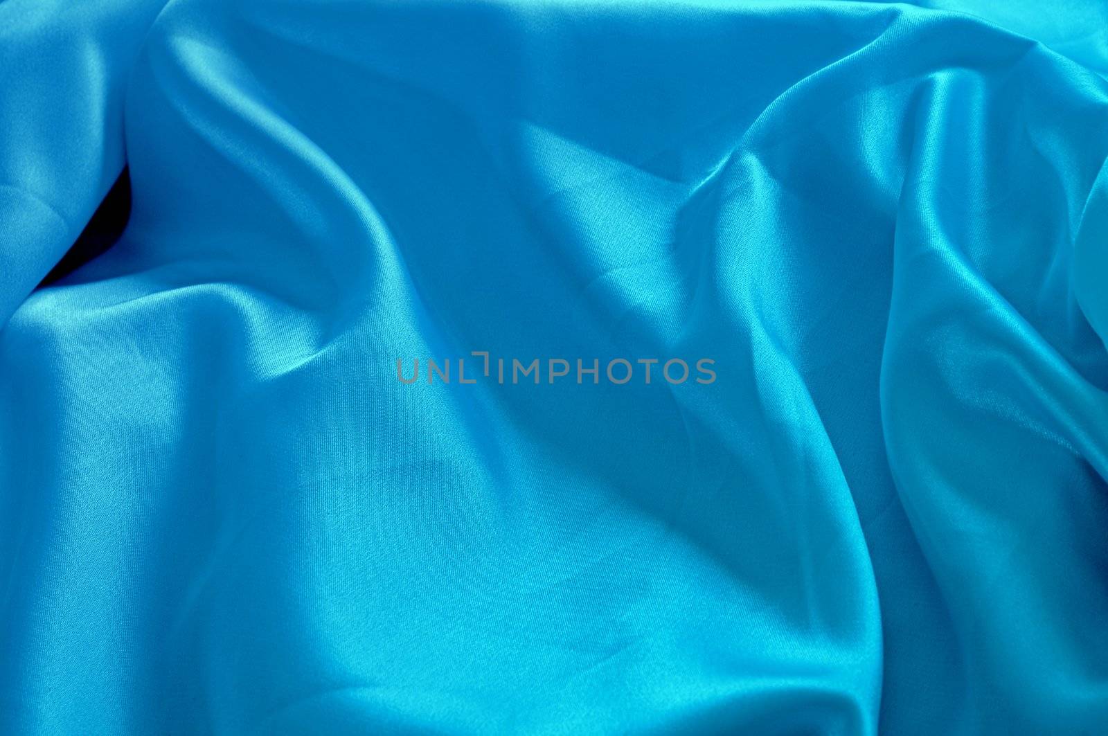 Bright sky-blue silk cloth waves