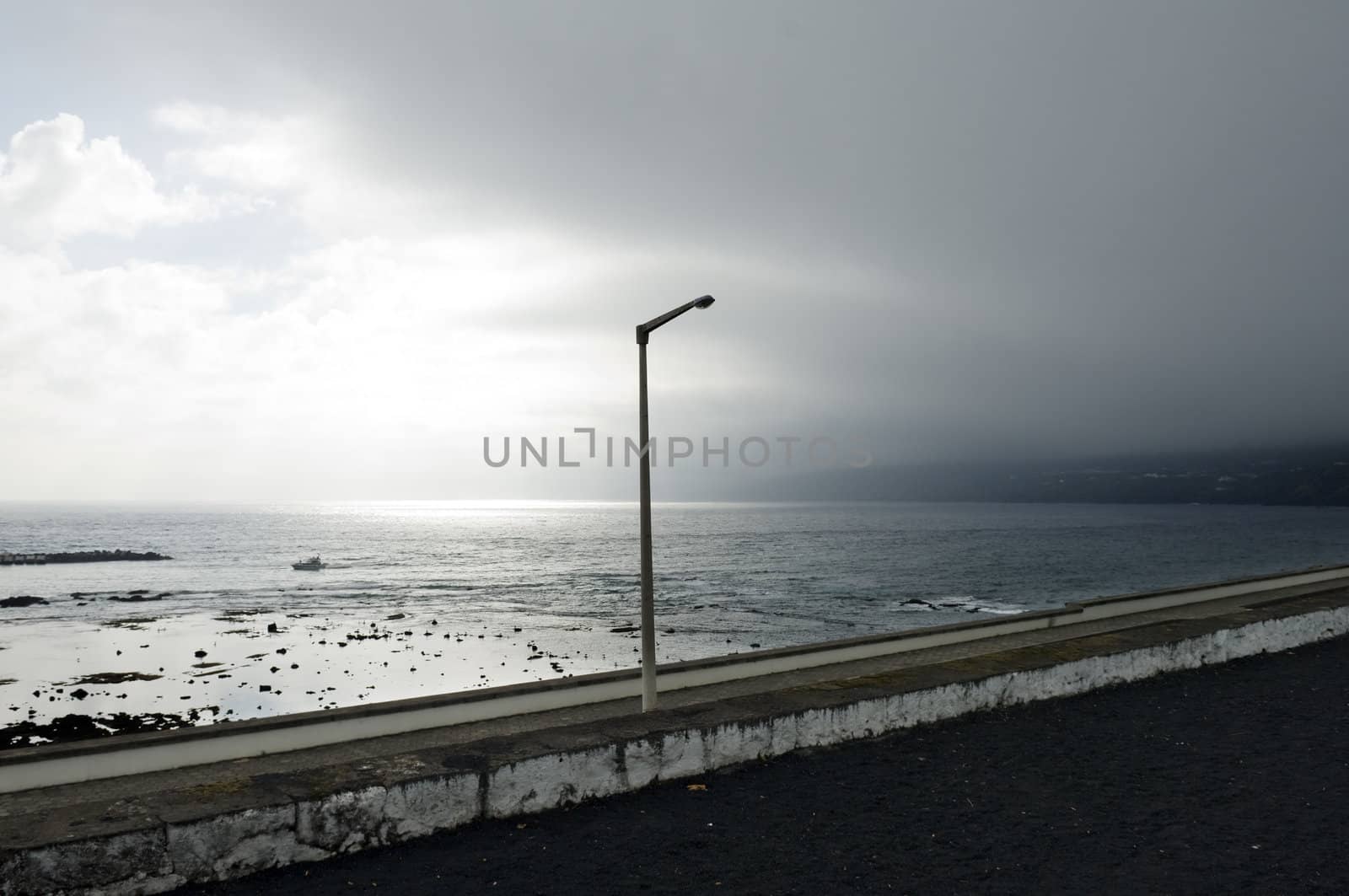 Rainstorm over the ocean approaching in the afternoon