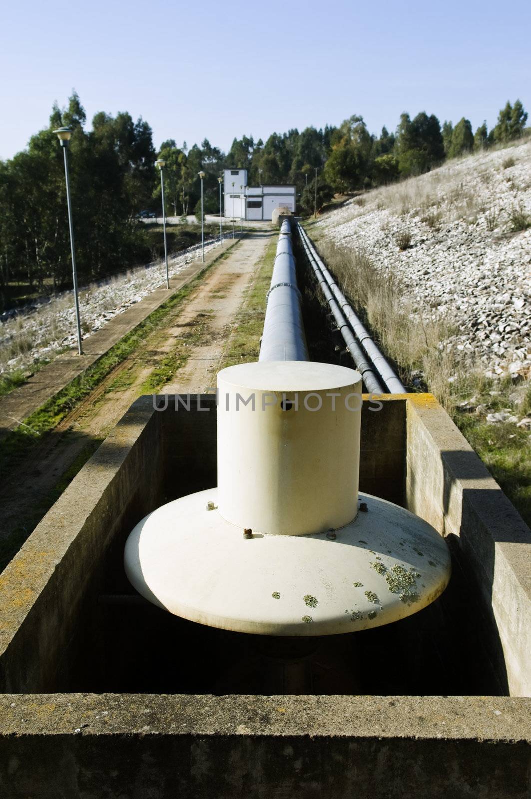 Water lift station and pipework near a dam 