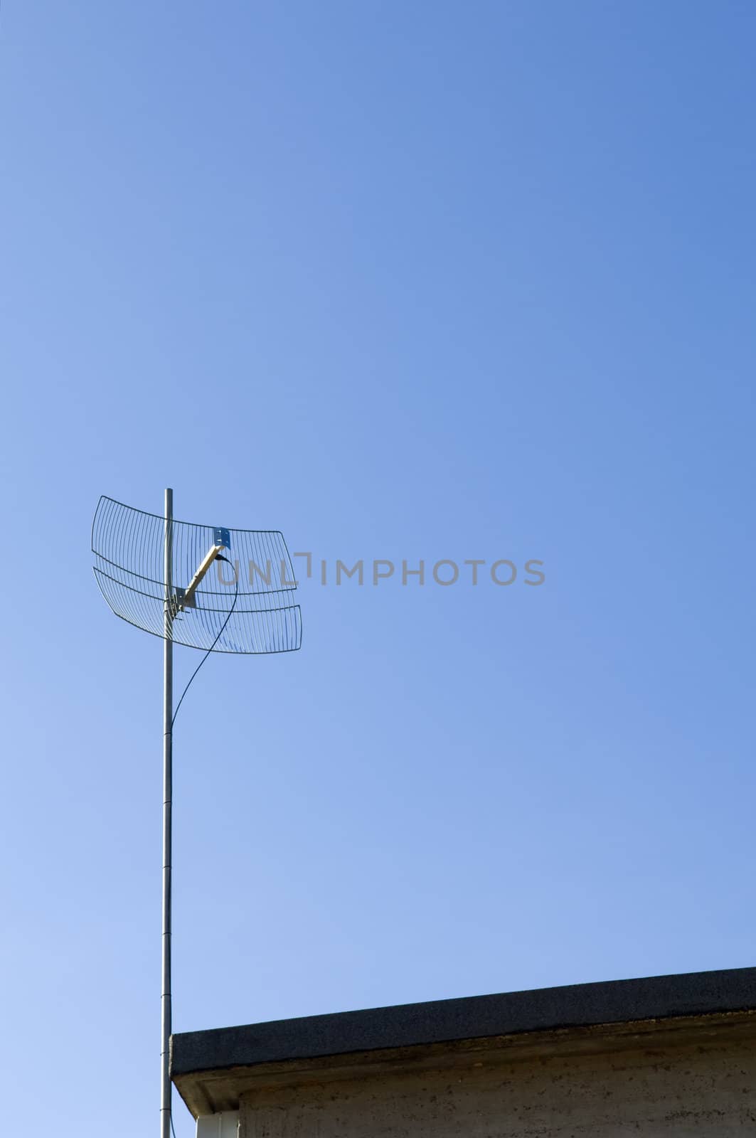 Satellite dish on a blue sky background