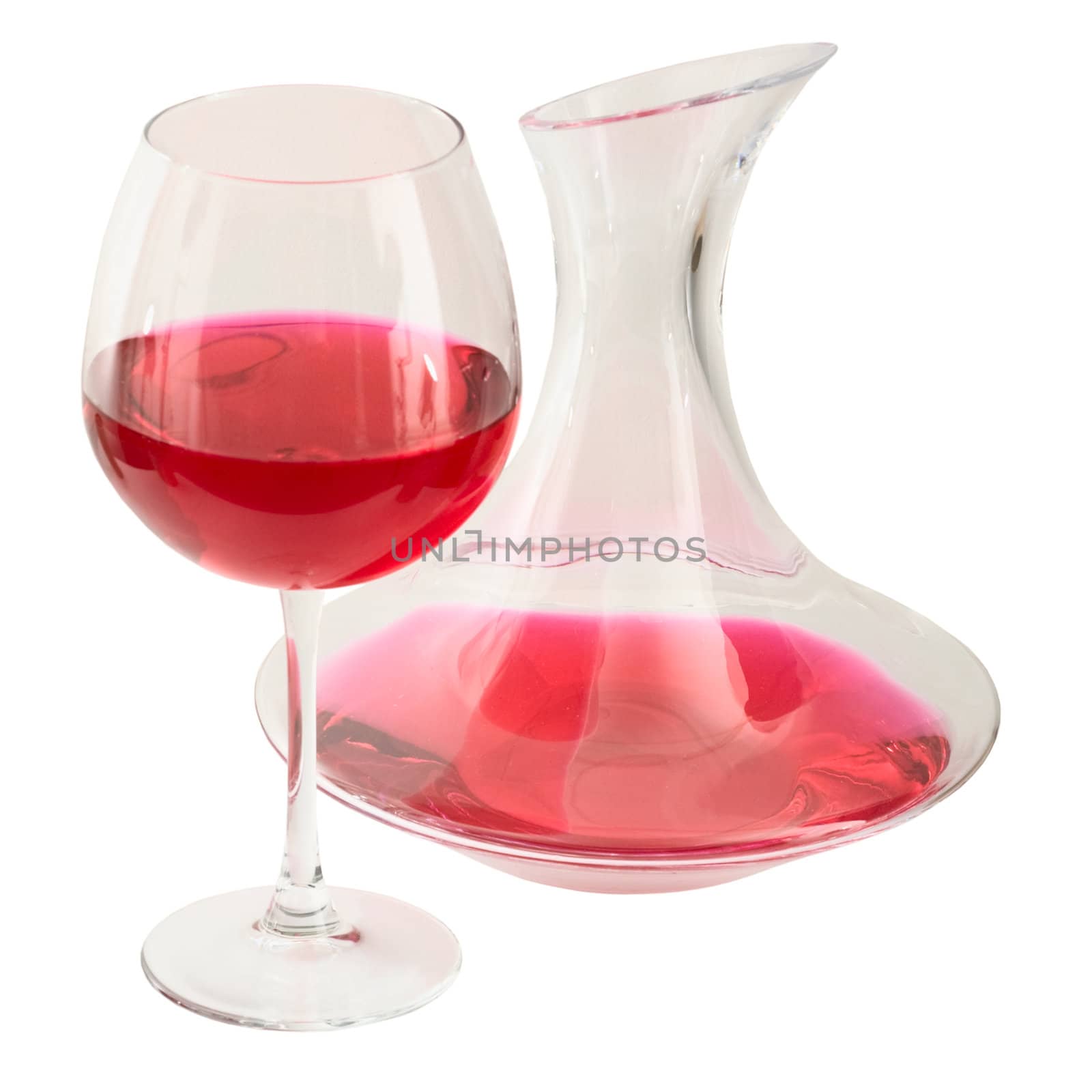 Decanter and goblet on the white background