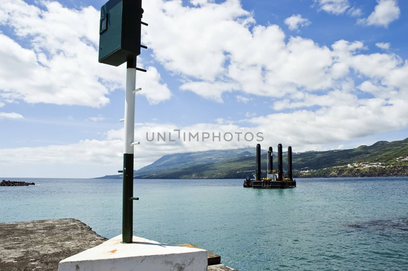 Dredger working ashore in Pico island, Azores, Portugal
