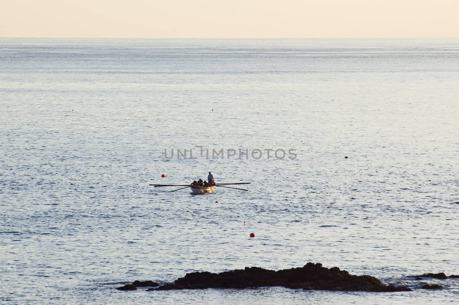 Whaler rowboat approaching, Pico island, Azores, Portugal
