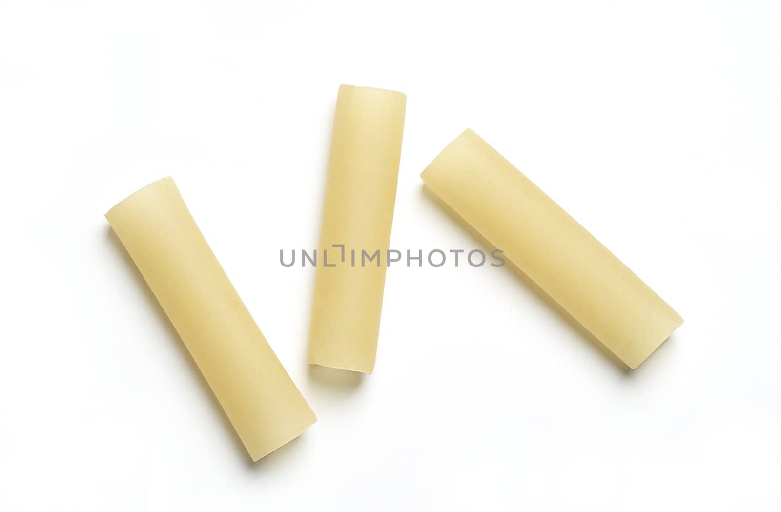Italian pasta "maccheroni" isolated on white