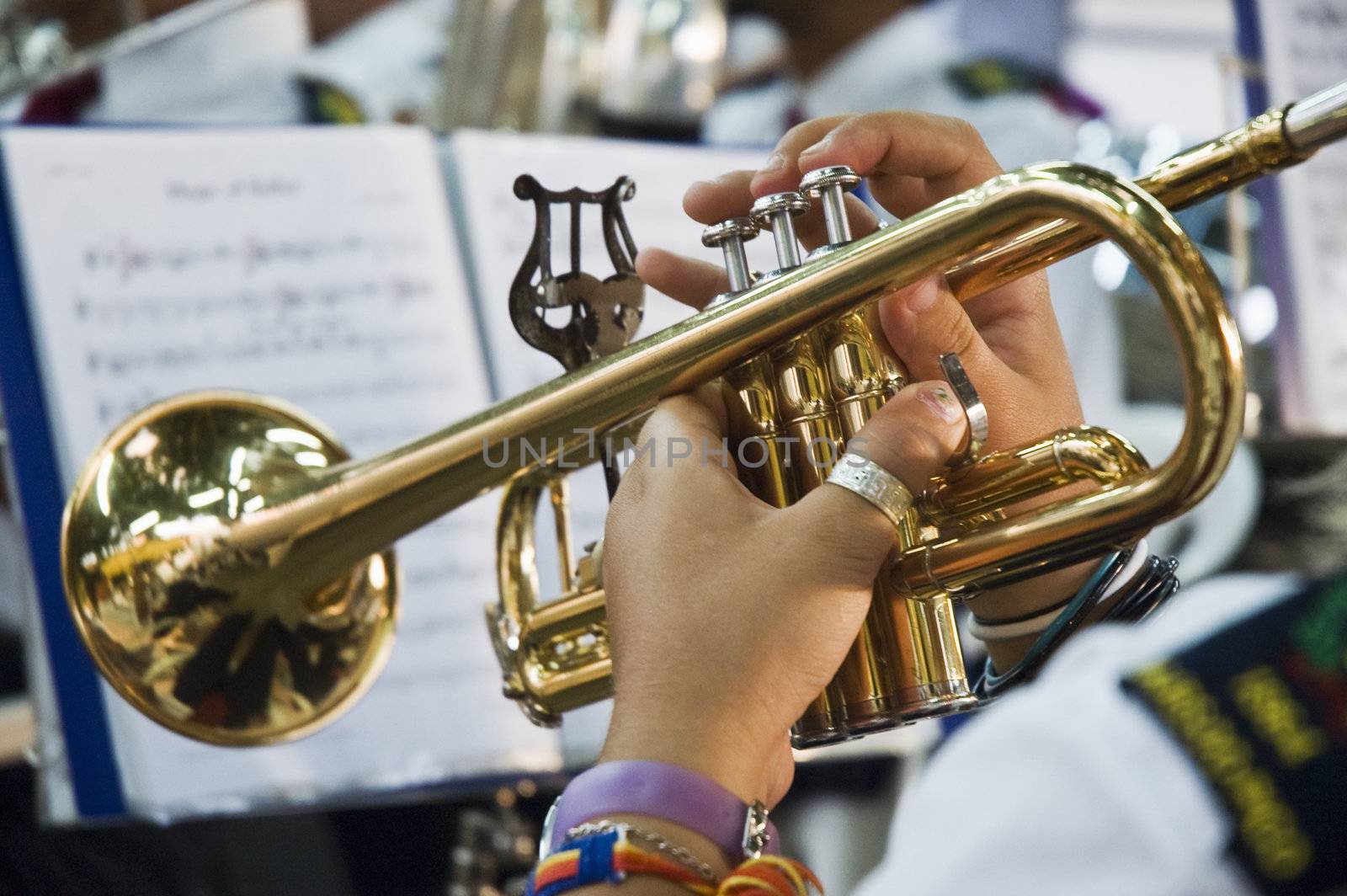 Musician playing the trumpet by mrfotos