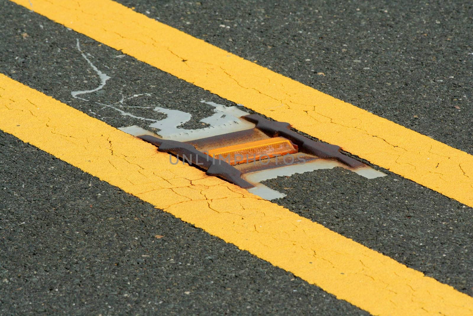 A Road reflector lane marker in the street