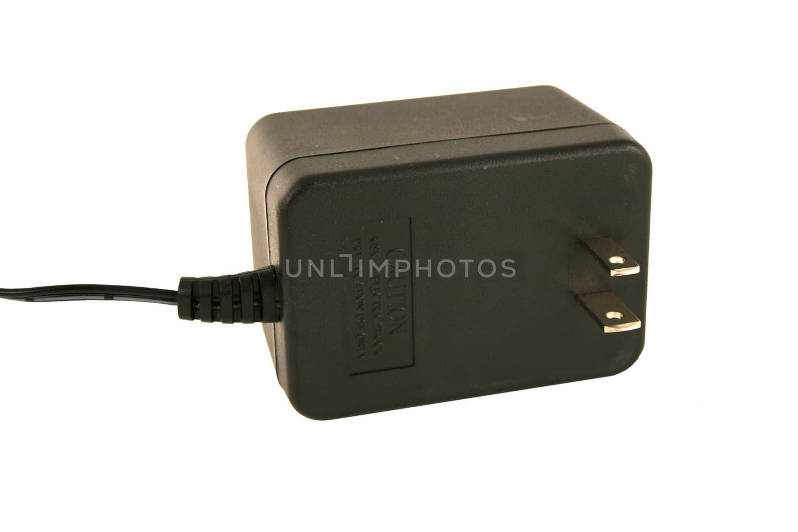 A Isolated AC adaptor plug on white