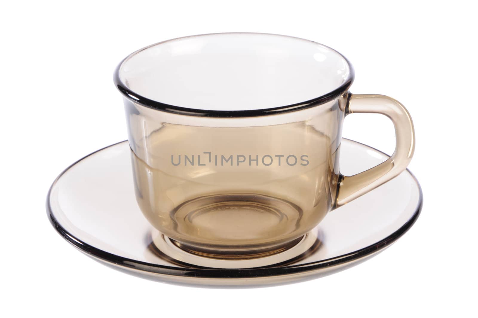 empty transparent cup and saucer on white