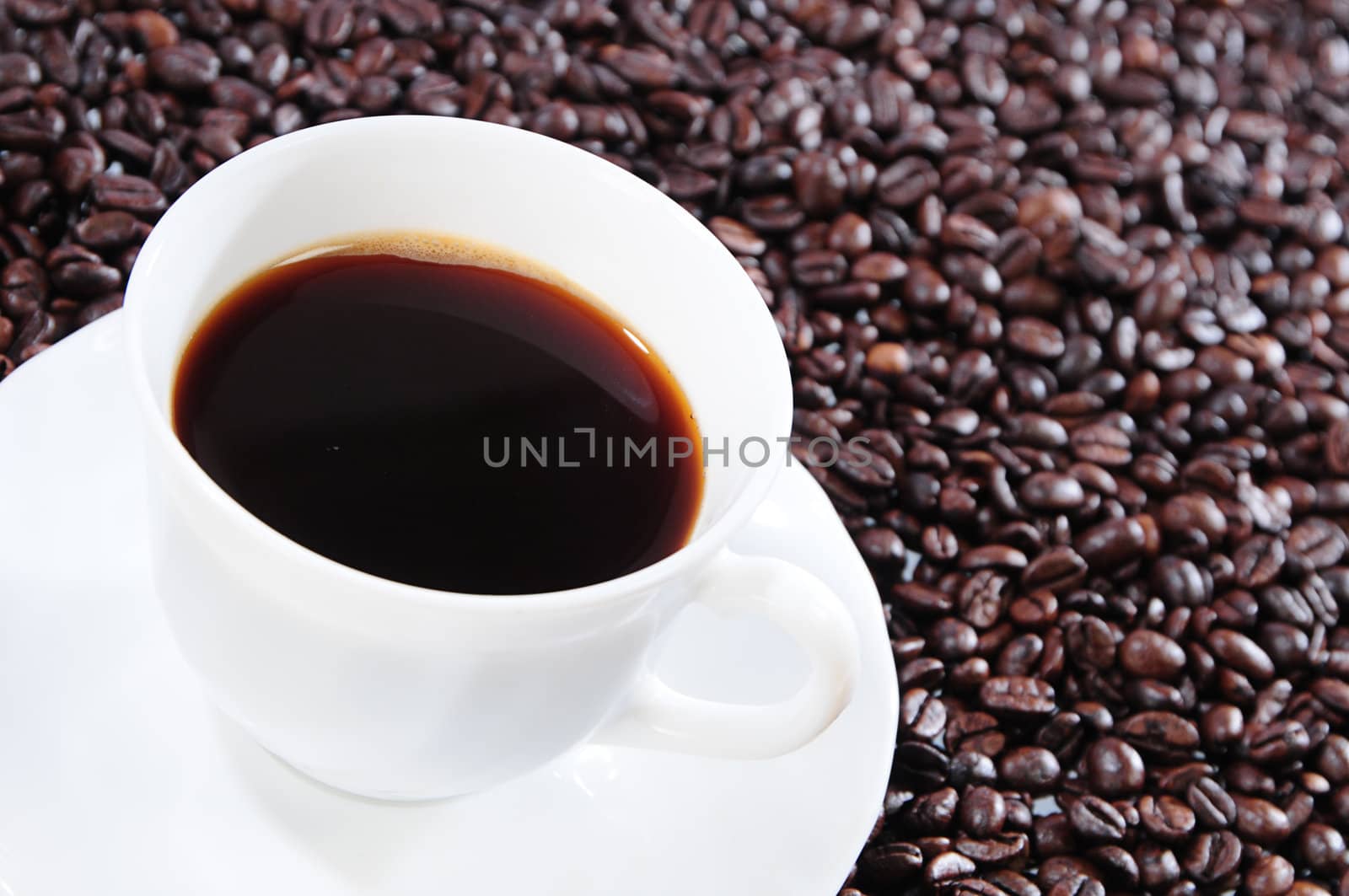 black coffee in a white cup by dyoma