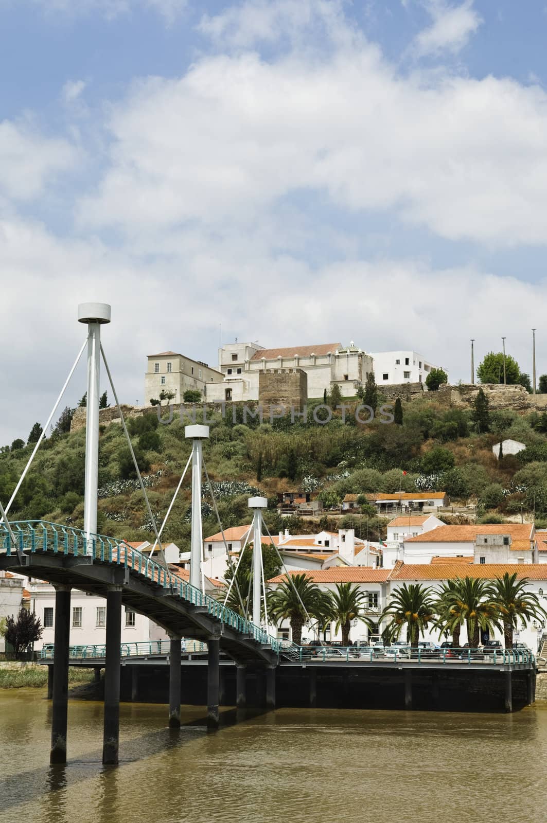 Modern footbridge over river Sado, Alcacer do Sal, Alentejo, Portugal
