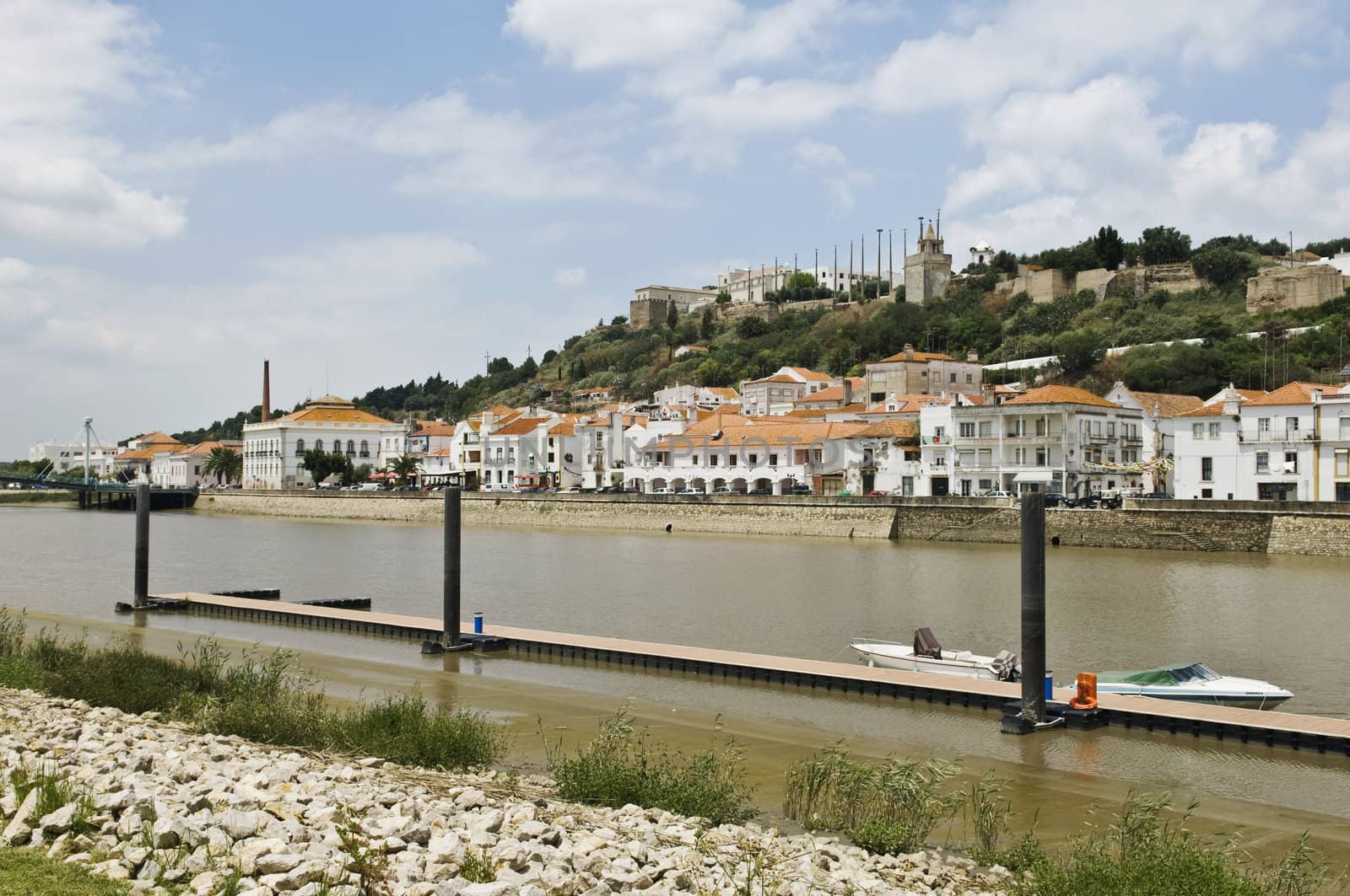 View of the historic town of Alcacer do Sal and the river Sado, Alentejo, Portugal
