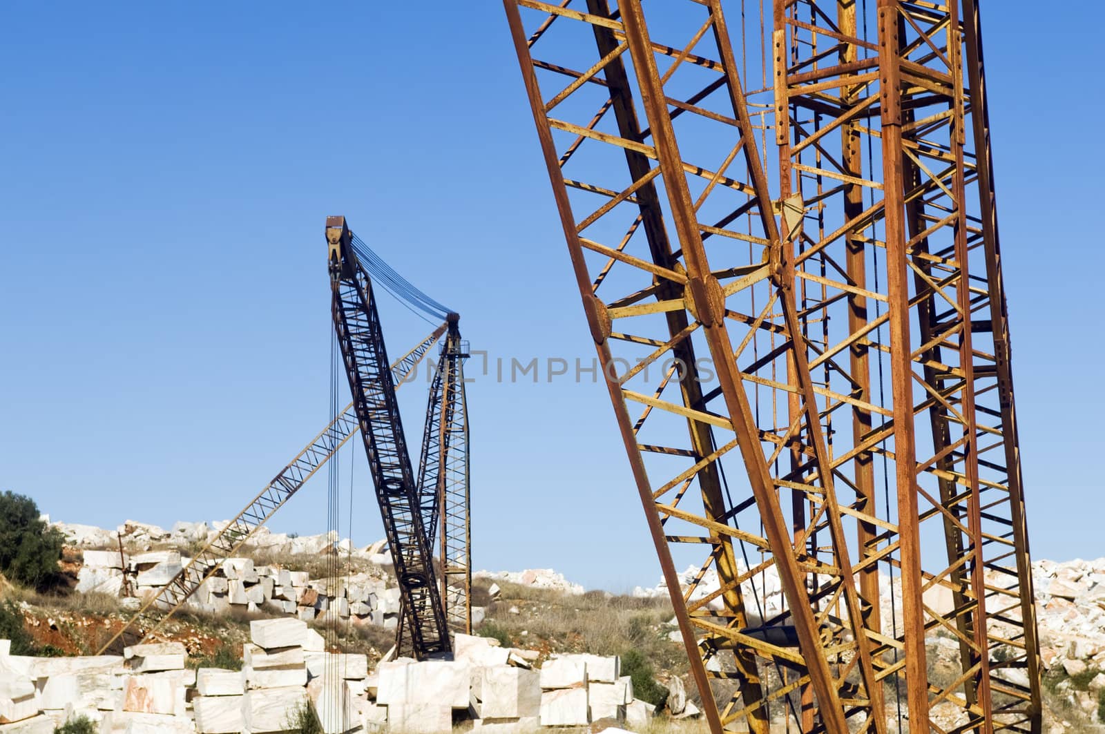 Cranes and marble blocks at a quarry near Vila Vi�osa, Alentejo, Portugal