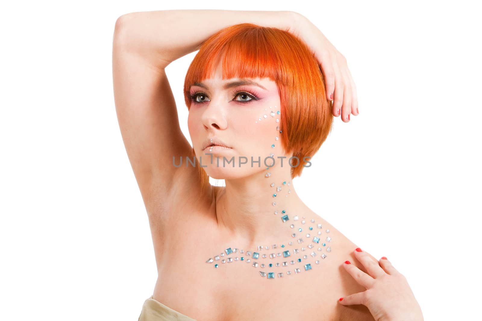 Beautiful redhead Caucasian girl with rhinestones and arm around her head and hand on shoulder, isolated