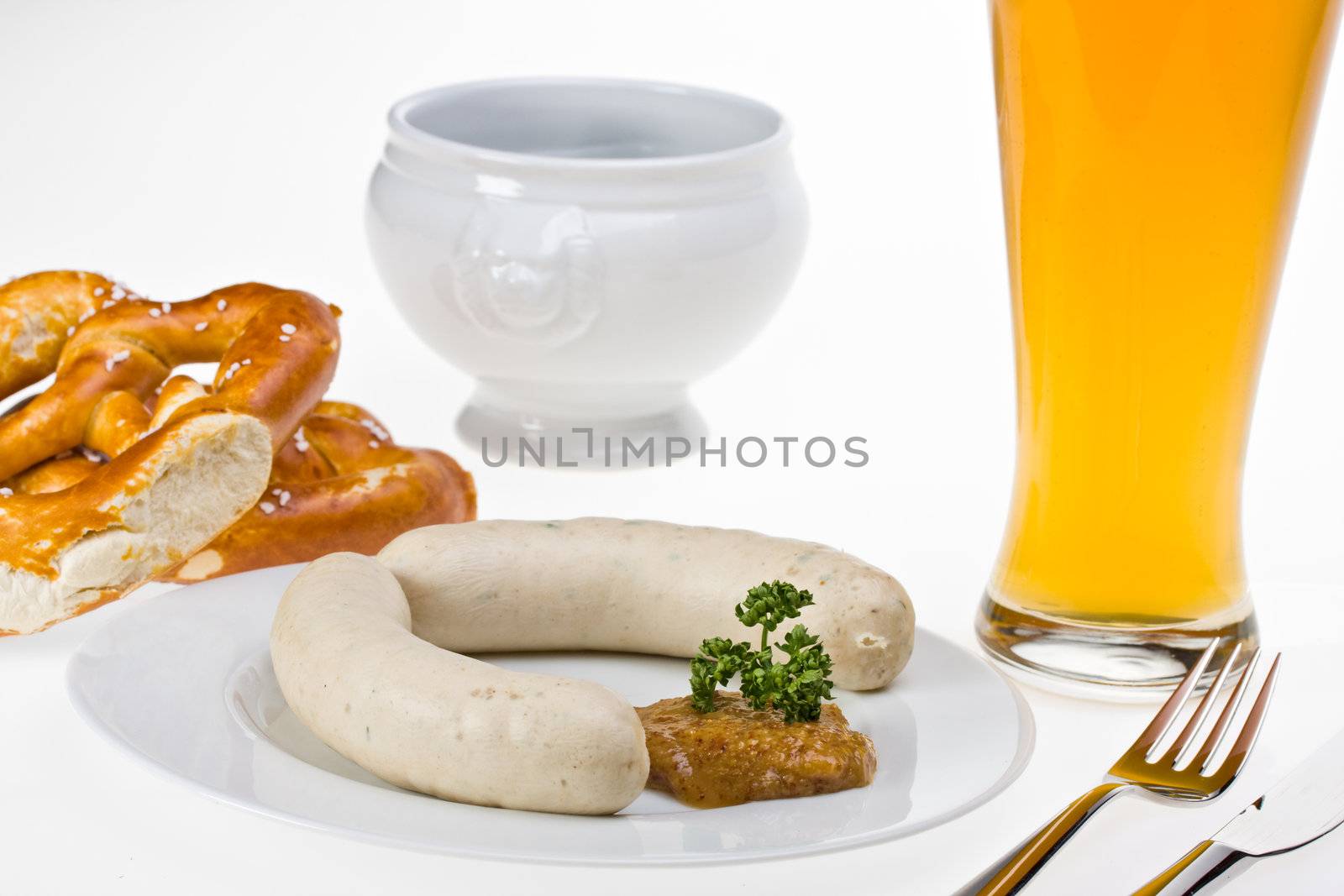 bavarian white sausage, wheat beer and pretzel