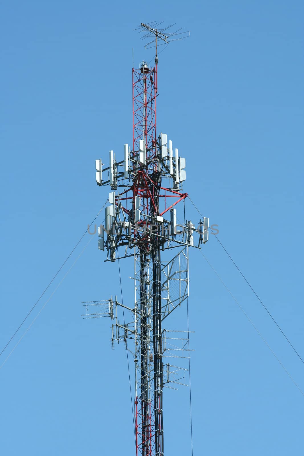 Cell Phone Tower against a blue sky