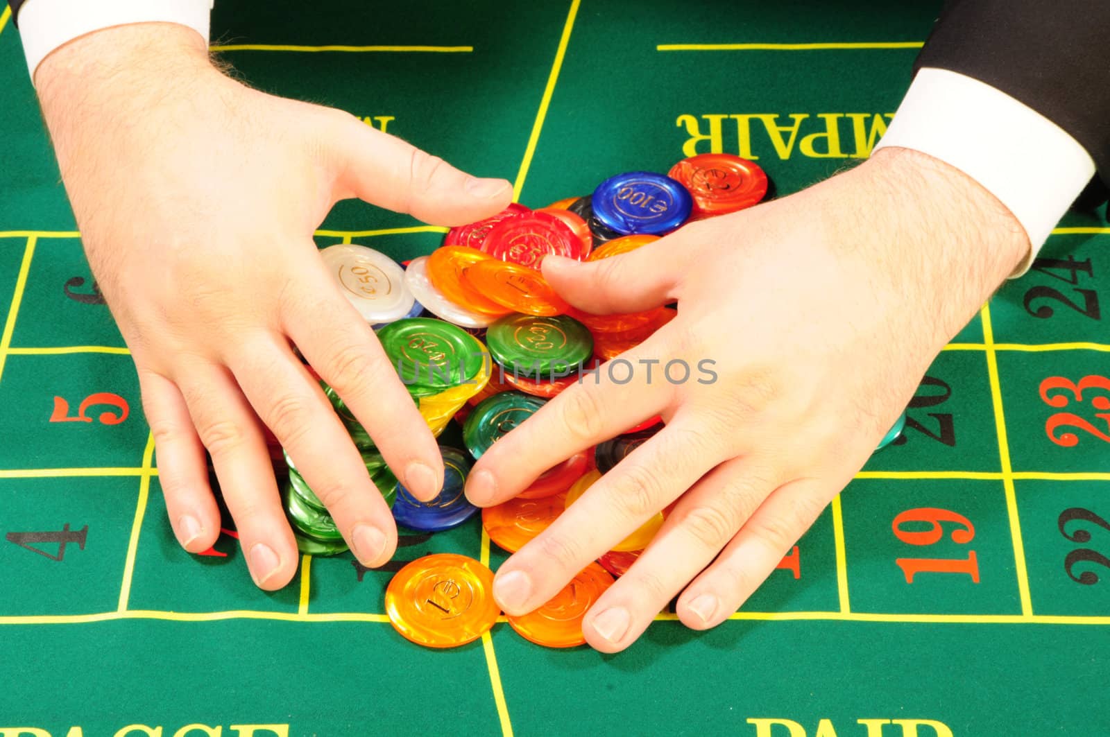 hands of the player collecting the chips won