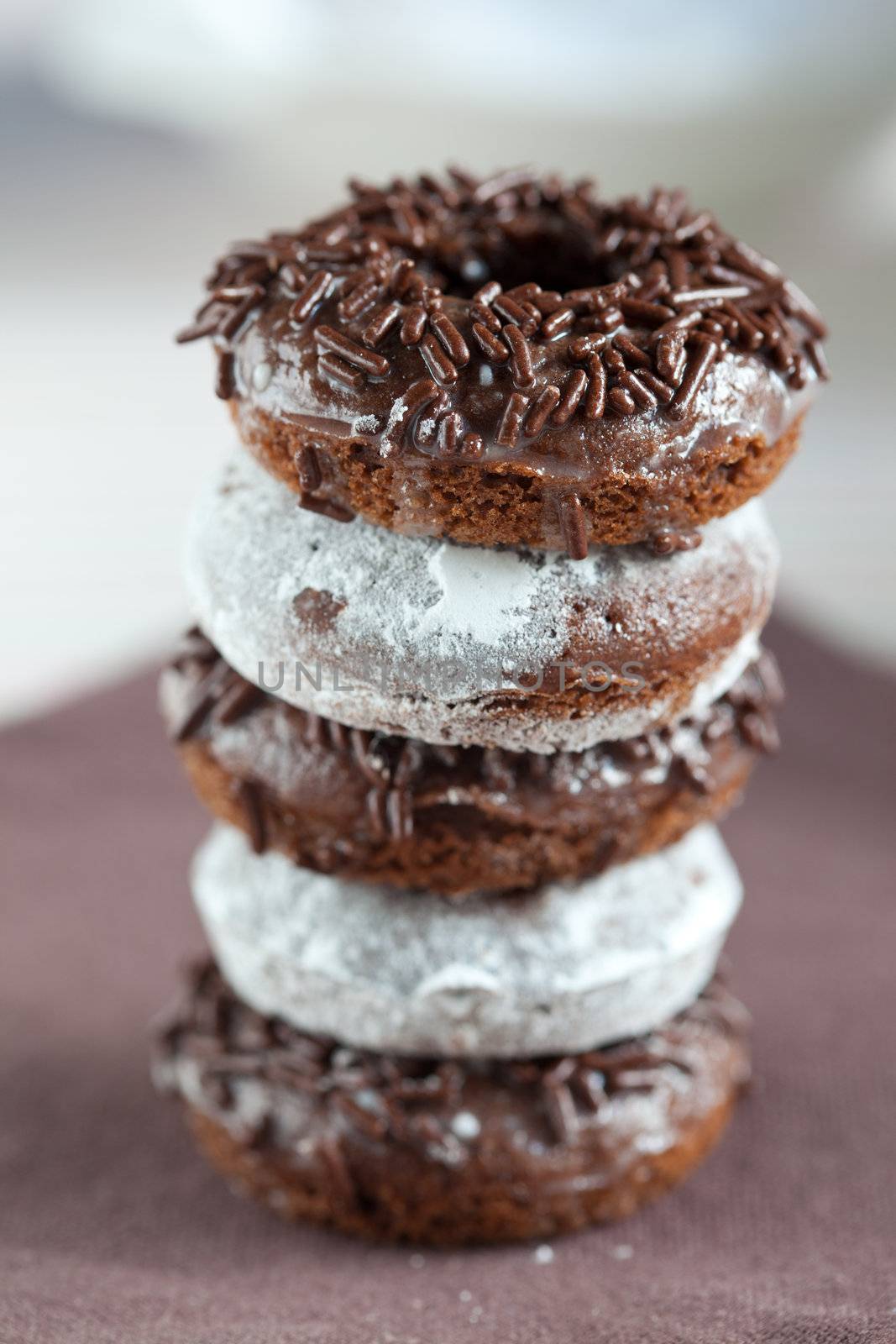 Stack of doughnuts by Fotosmurf