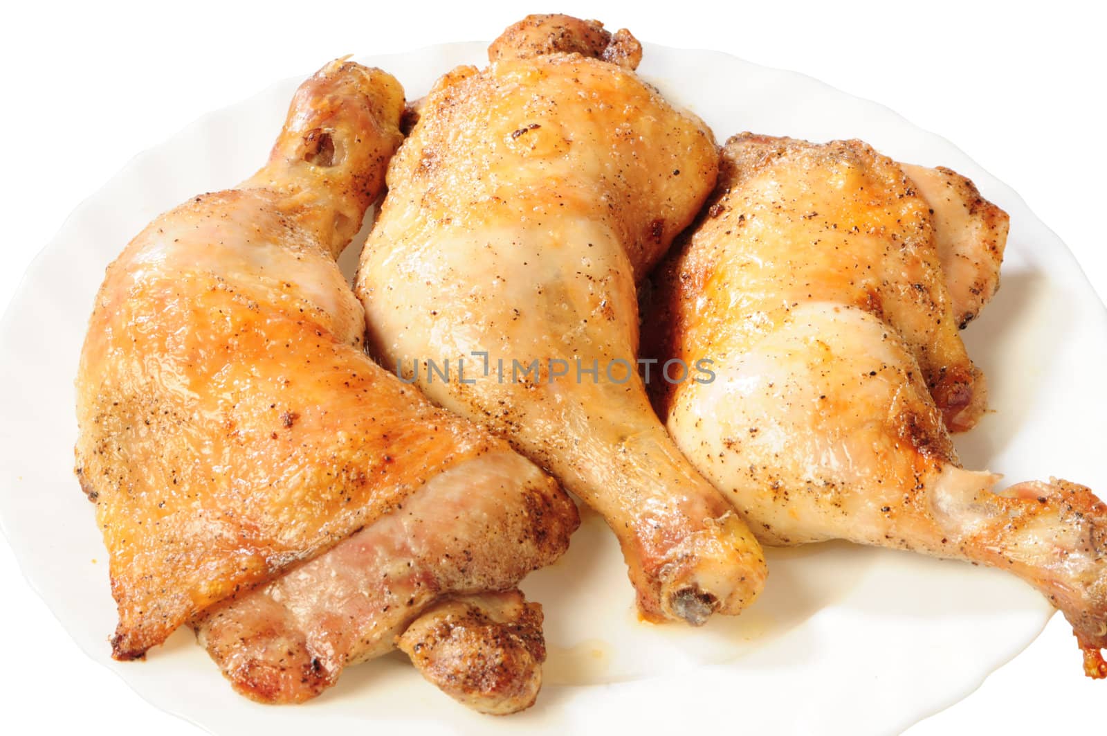 fried chicken legs on white plate by dyoma