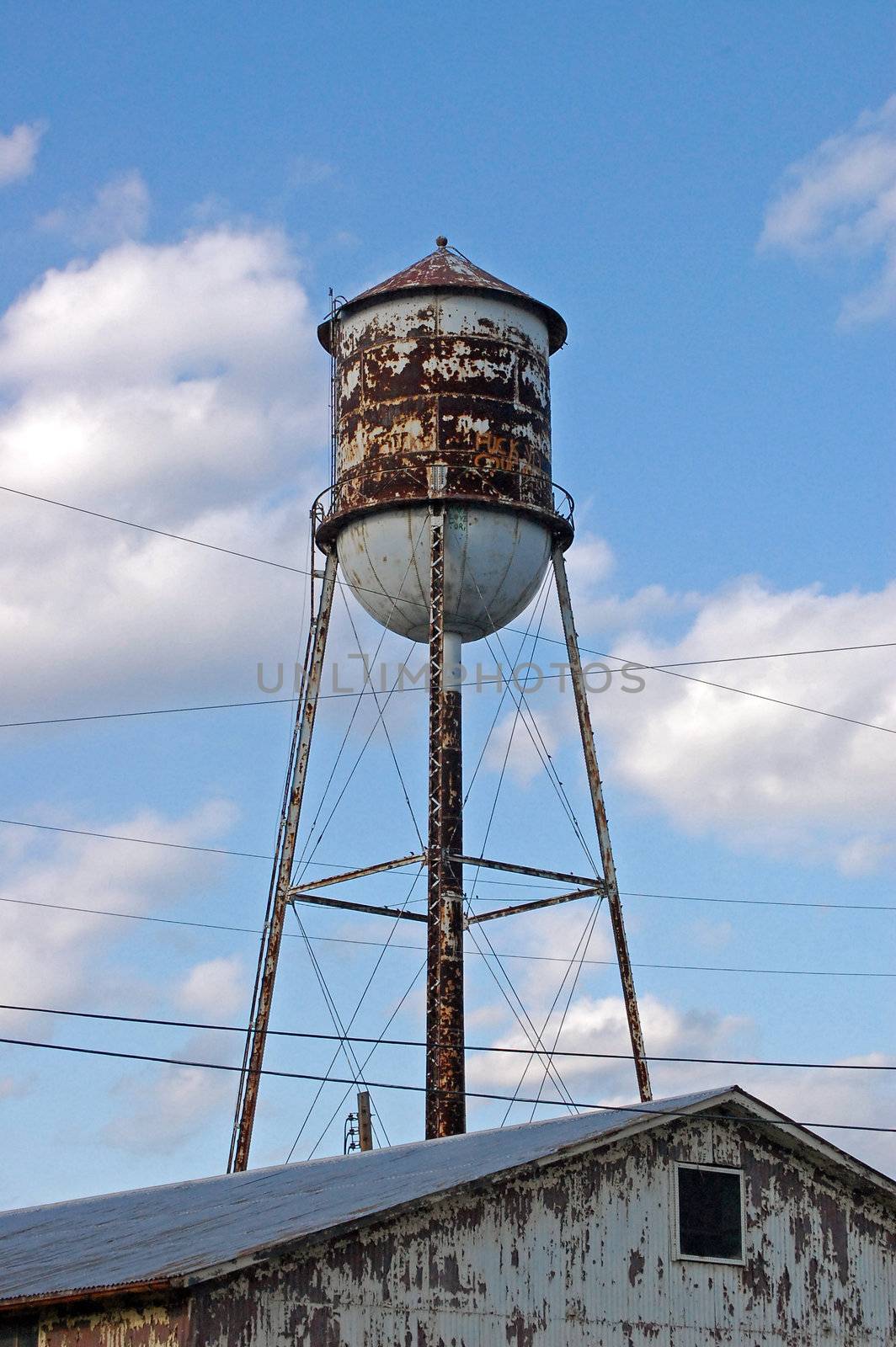 Water Tower in the Clouds by RefocusPhoto