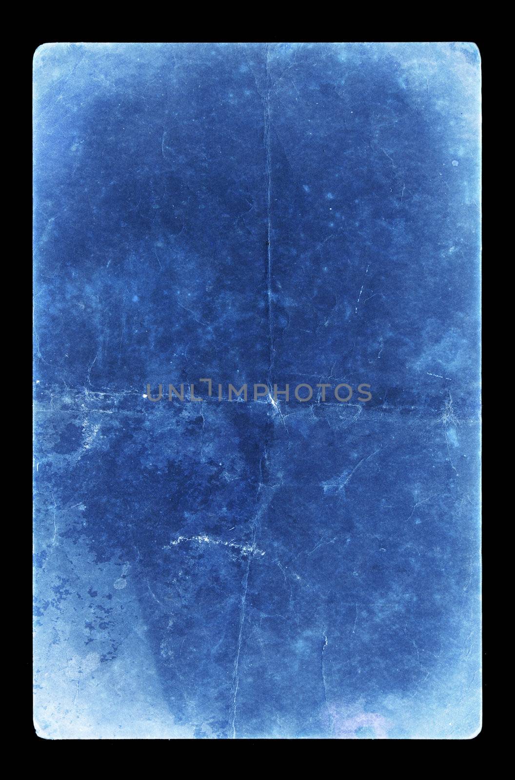 An isolated old grunge paper on a black background
