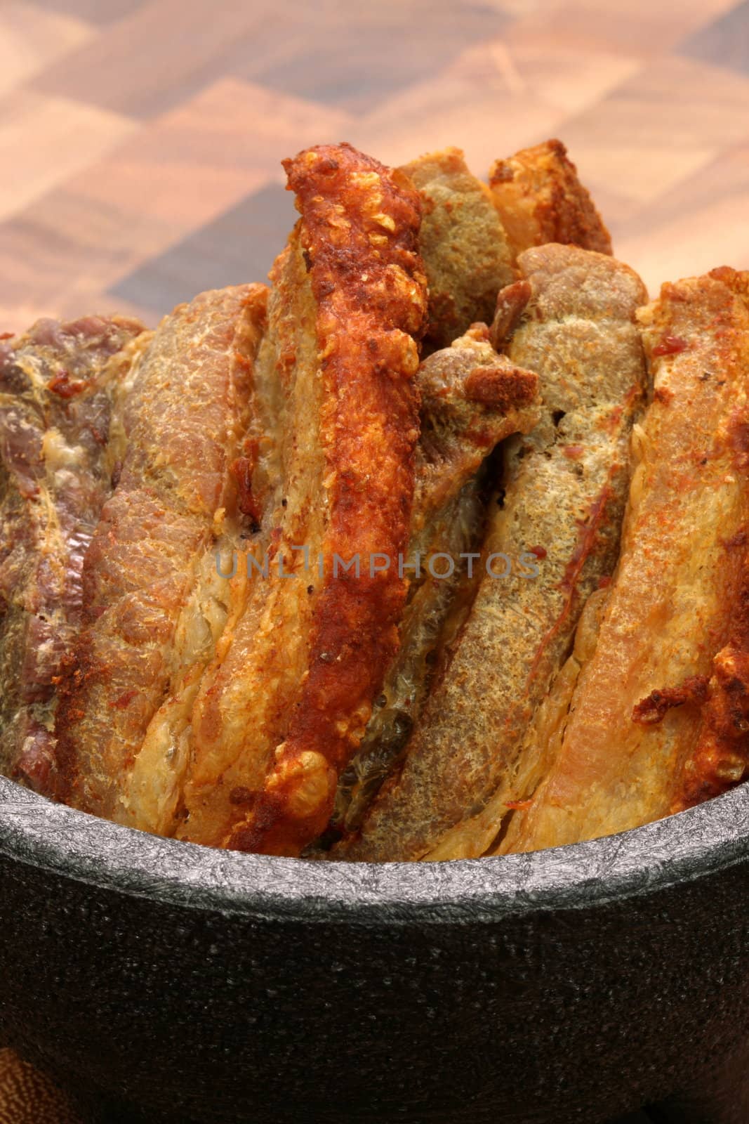 fried delicious mexican chicharron carnudo or fried mexican  pork skin with atached meat  exquisite famous mexican plate or snack