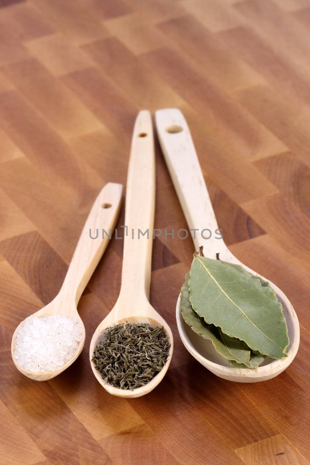 wood spoons with ingredients  by tacar