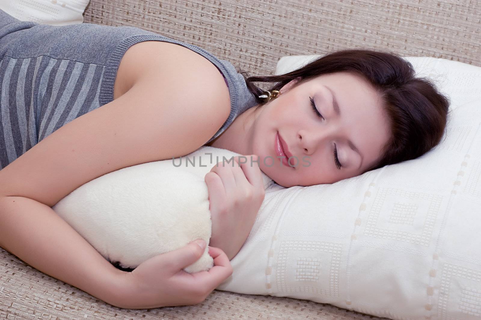 Calm woman sleeping on pillow