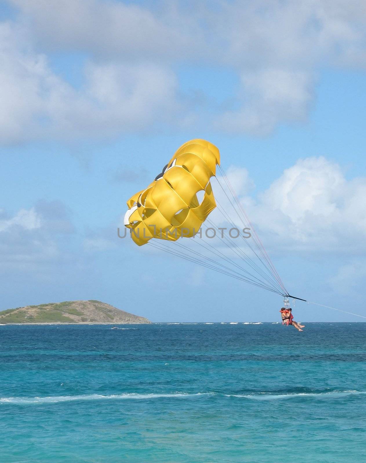 A view of parasailing in the Caribbean, just off the island of St. Maarten on a beautiful afternoon in January