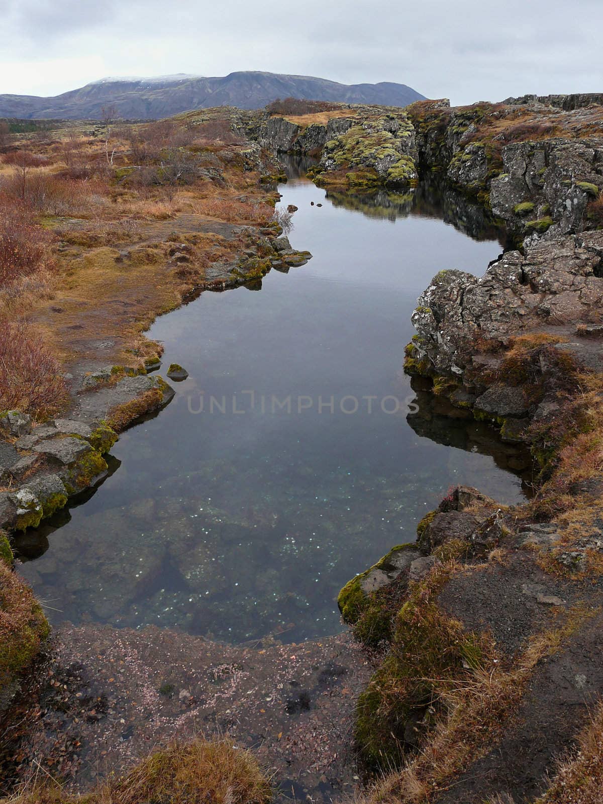 Thingvellir, a fissure in the earth's crust where the european and american continents slowly drift apart. It's also the place where the first Icelandic parliament seated.