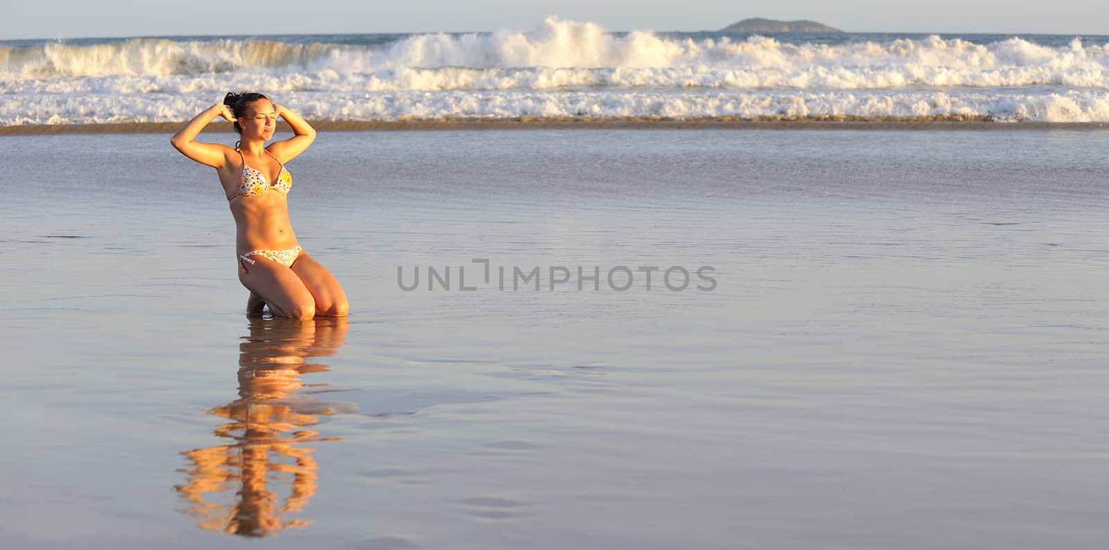 Pretty woman enjoying the beach in Buzios, Brazil