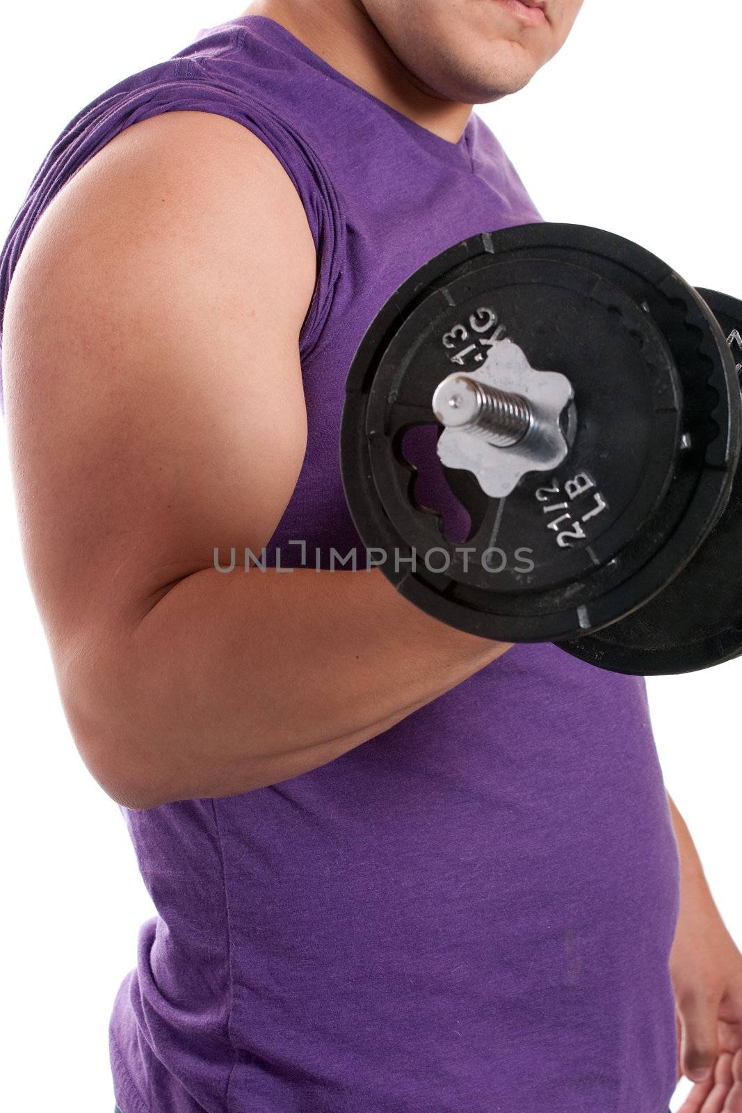 A young man lifting a dumbbell over a white background.