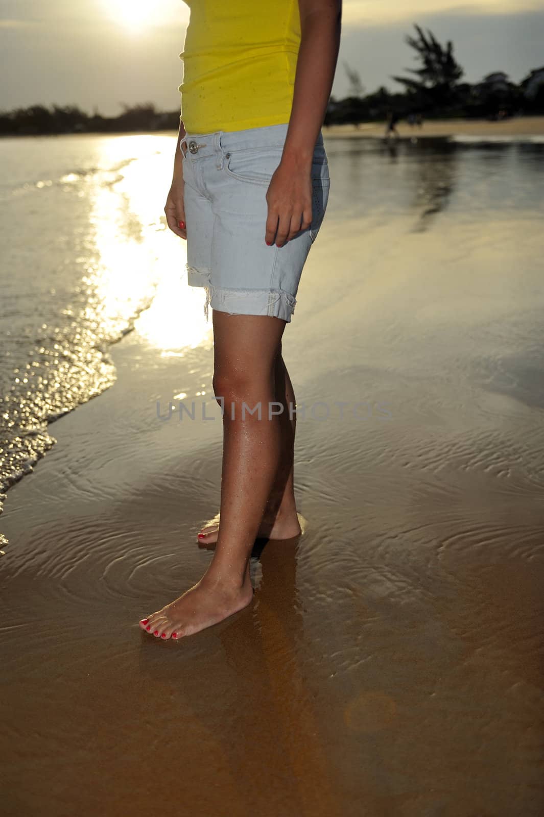 Woman enjoying her holiday on a tropical beach in Brazil

