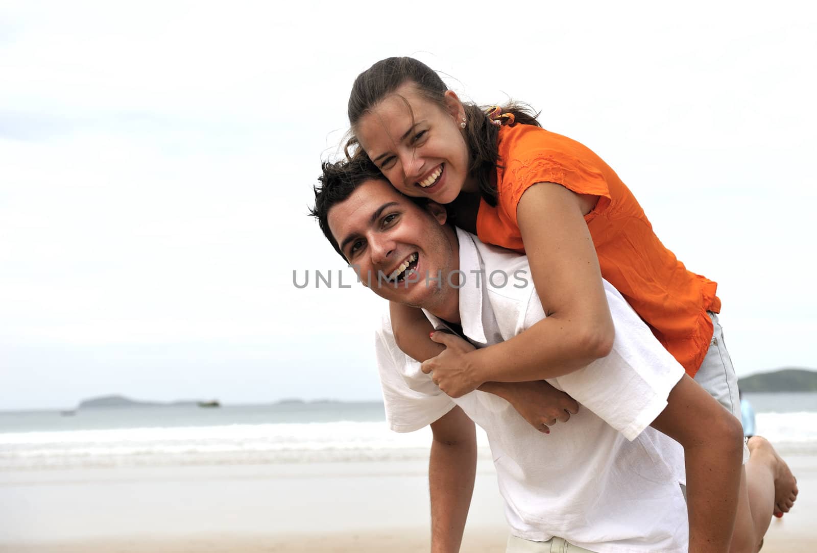 Loving couple having fun on the beach
