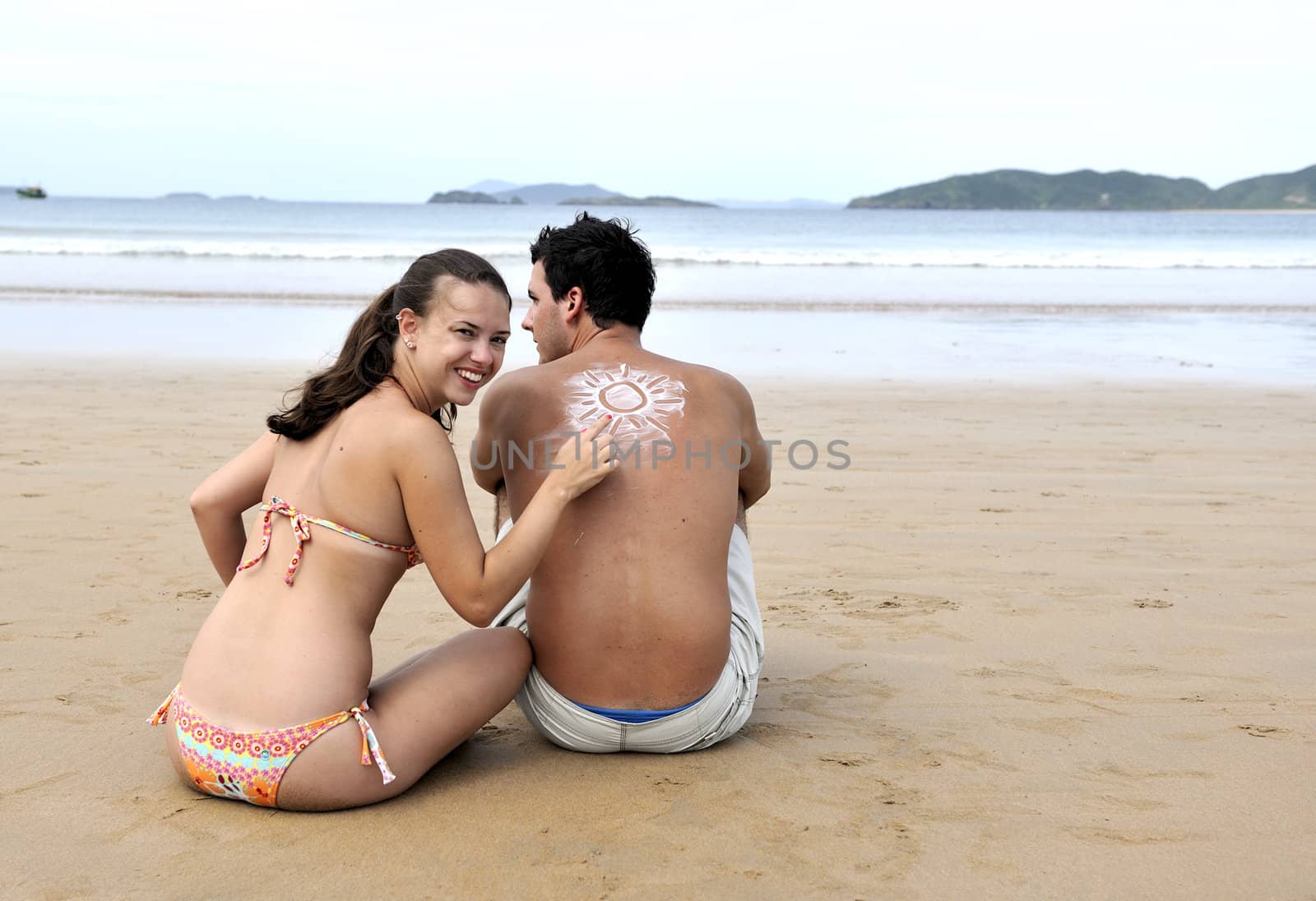 Loving couple having fun on the beach
