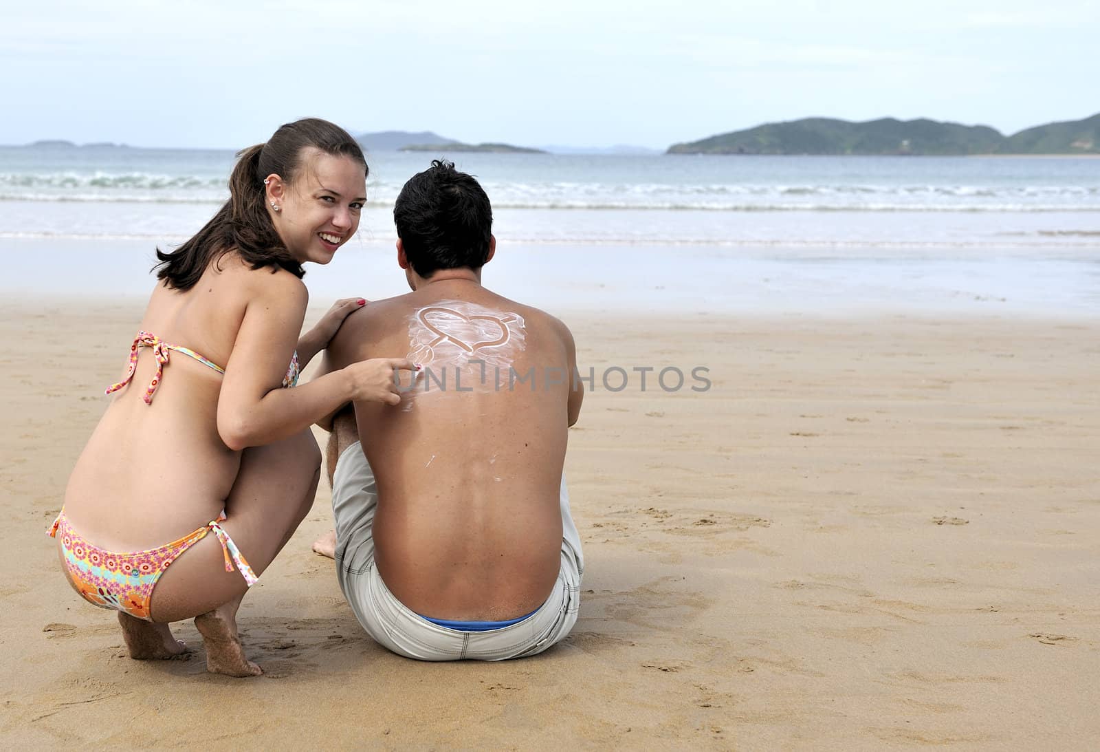 Loving couple having fun on the beach
