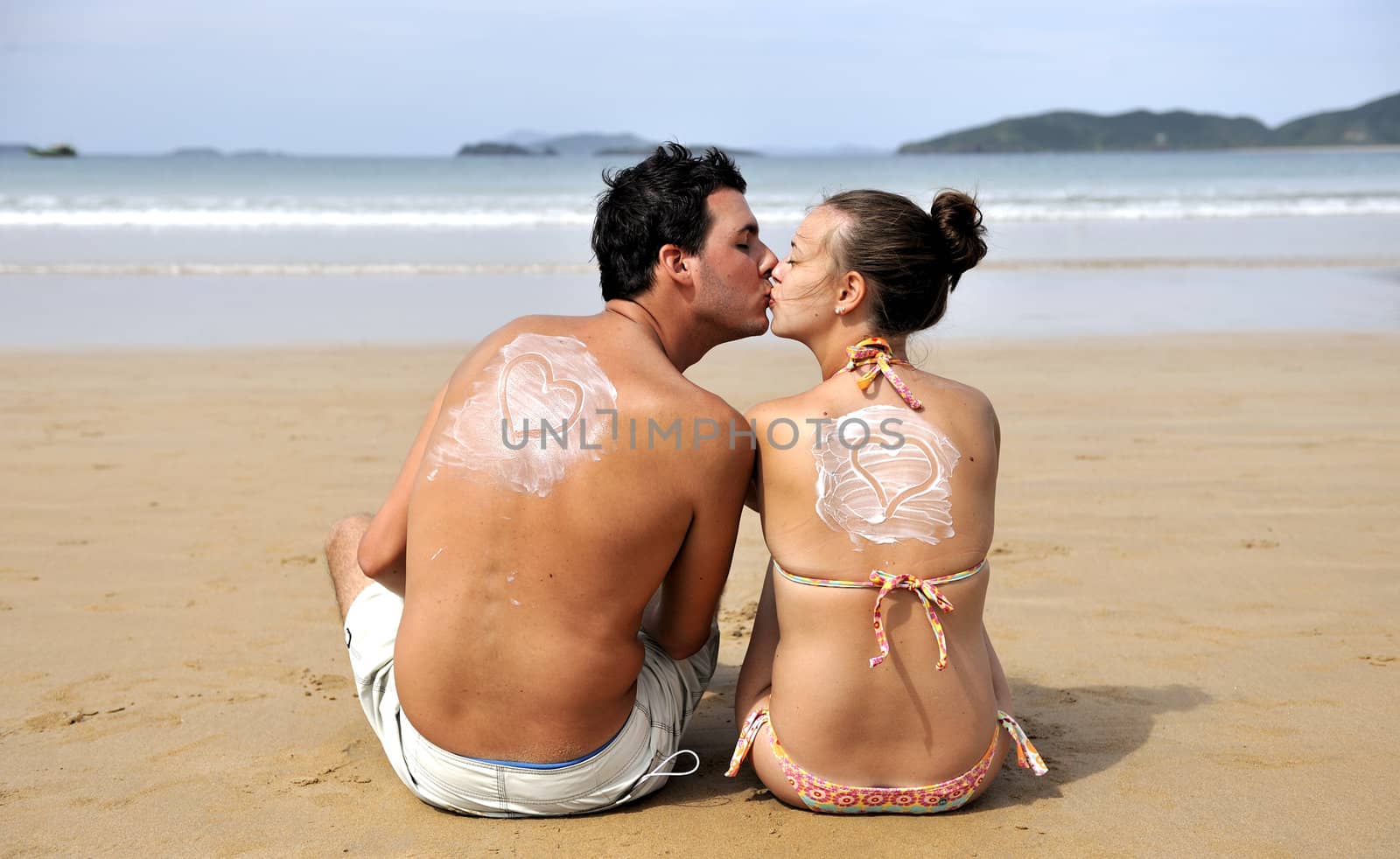 Loving couple having fun on the beach
