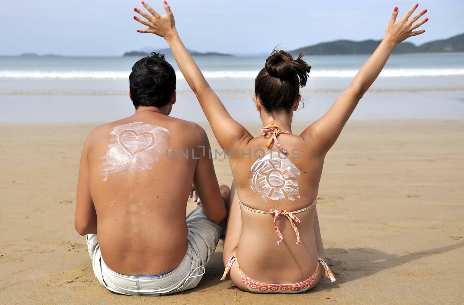 Loving couple having fun on the beach
