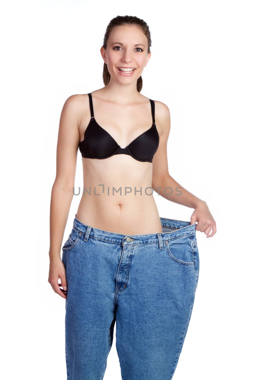 Weight loss girl holding pants