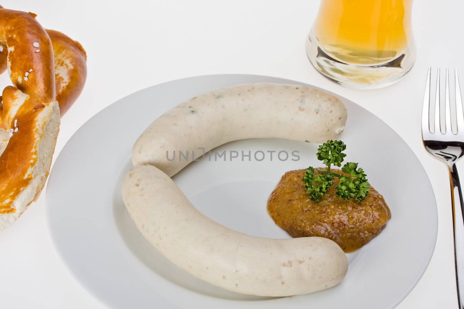 bavarian white sausage, wheat beer and pretzel