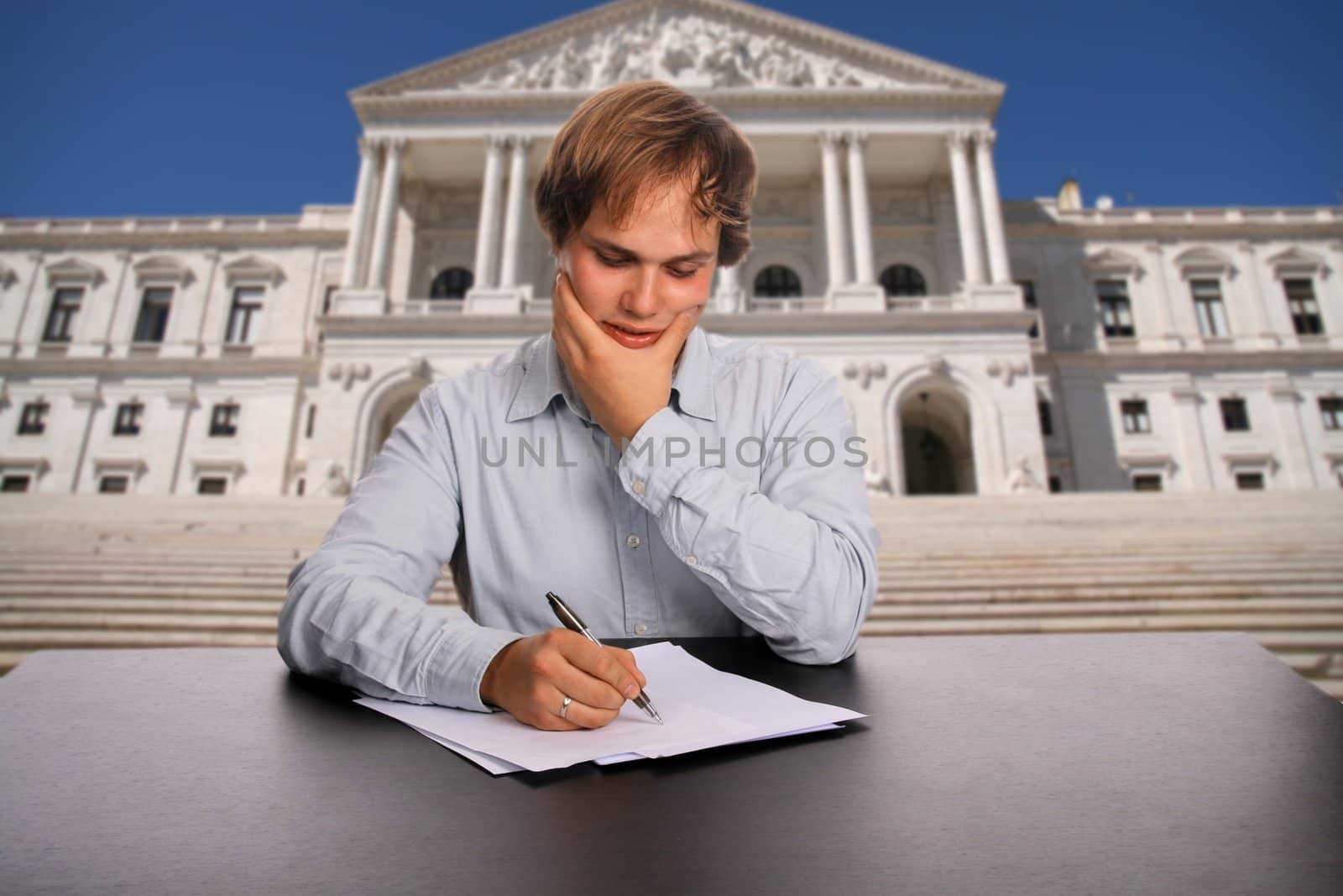 businessman signing contract over white background